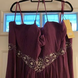 May Queen Couture strapless dress. Rhinestone and beading accents.